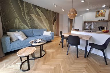 Salon w mieszkaniu na krótki wynajem we Wrocławiu